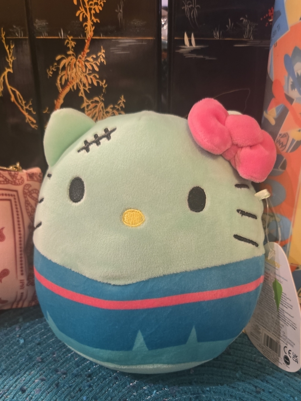 Squishmallows Hello Kitty Plush - Mint Green Body with Pink Bow and Blue Outfit